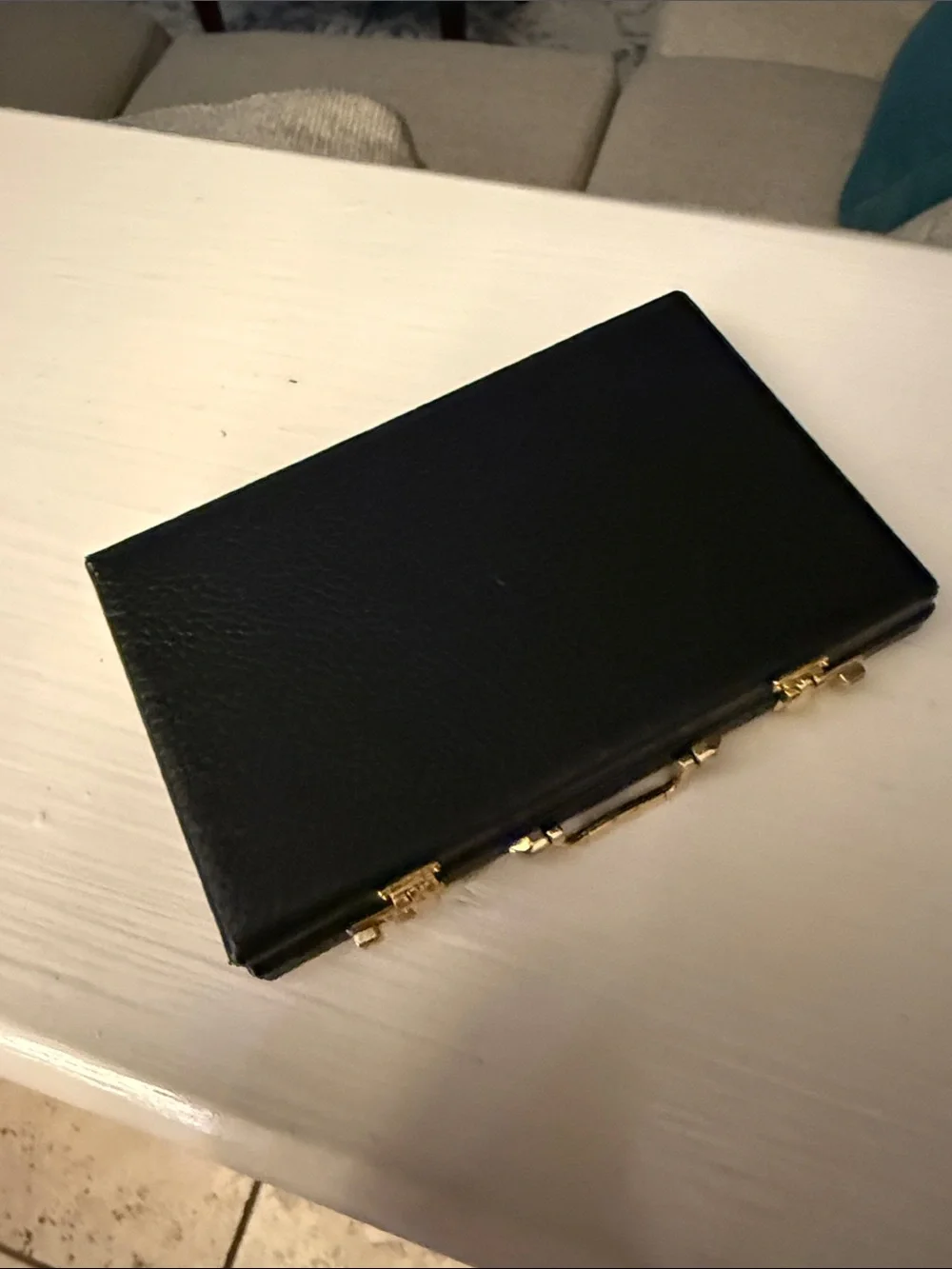 Source Unknown compact black